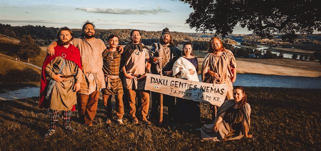 Members of the association on a hill at sunset