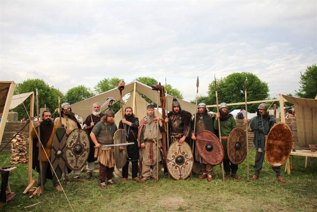 Warriors with shields and spears at the camp